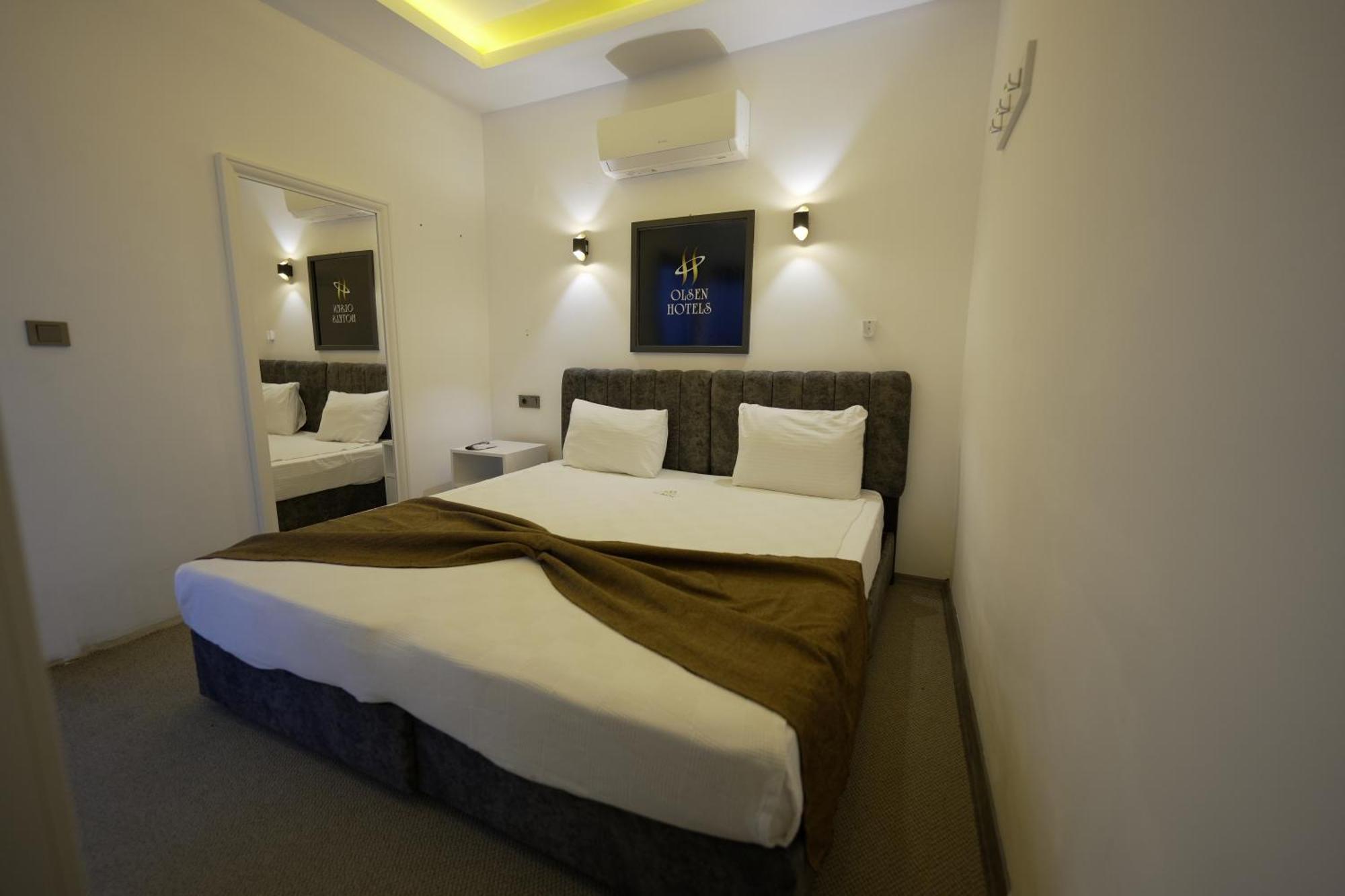 Olsen Hotel *